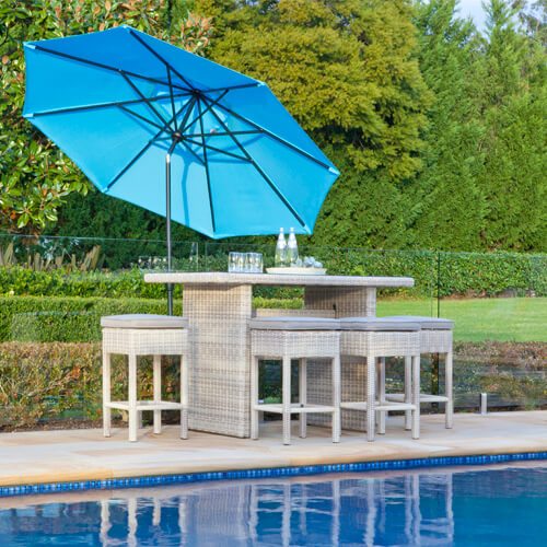 Outdoor furniture with Shelta umbrellas and settings