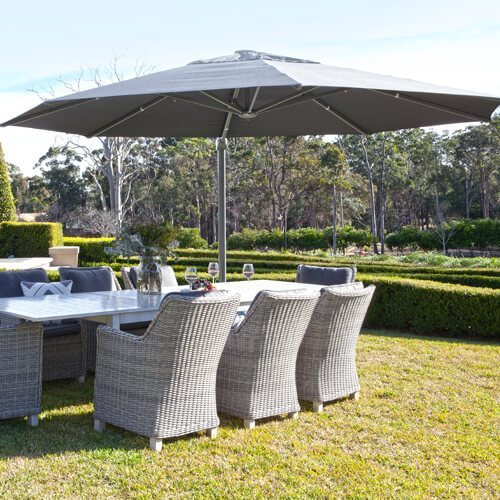 Outdoor furniture with Shelta umbrellas and settings